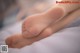 A close up of a person's foot with a bandage on it.